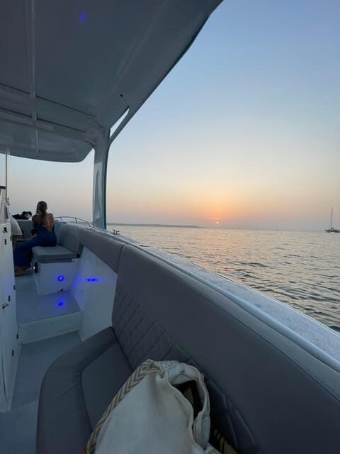 Cartagena: Private Sunset and Night Boat Tour - The Caribbean Sea portion: photo stops, the sunset switch, and the night glow
