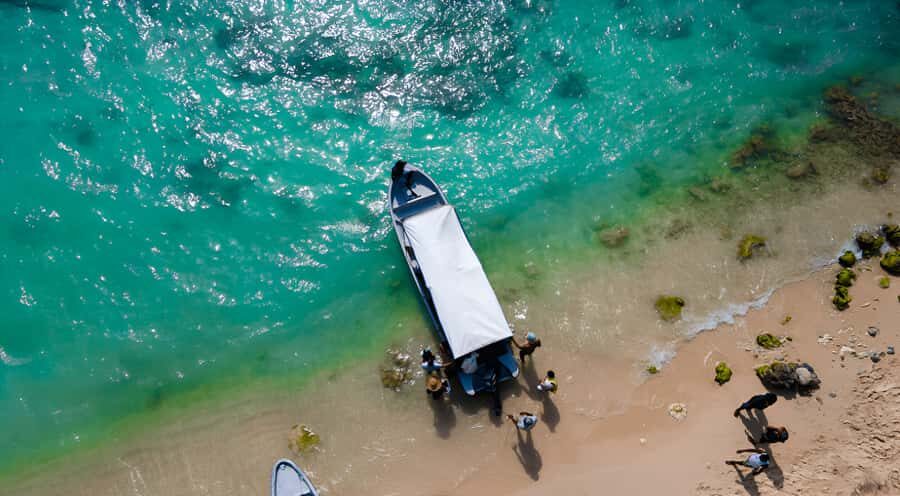 Cartagena: Tour to Playa Tranquila with Snorkeling + Luminous Plankton and Parasol - The big beach block: lunch, snack, and using the facilities