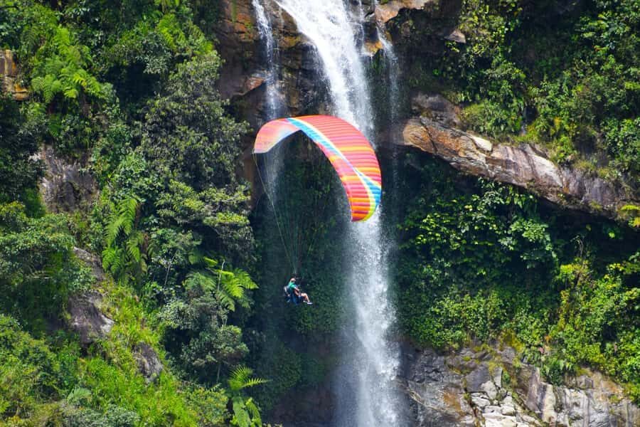 From Medellín: Paragliding Flight and Guatape Tour - Paragliding over Cocorná: timing, safety, and what to expect