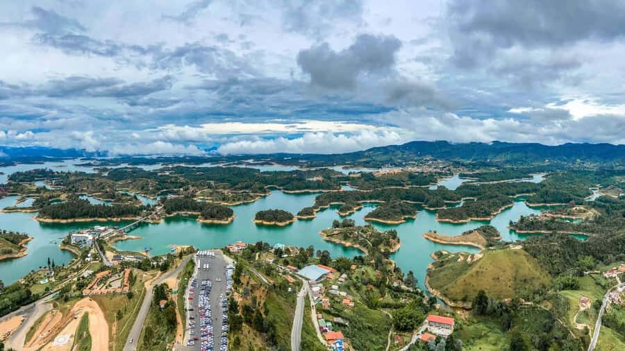 From Medellín: Paragliding Flight and Guatape Tour - How to prep: clothing, cash, and the document check
