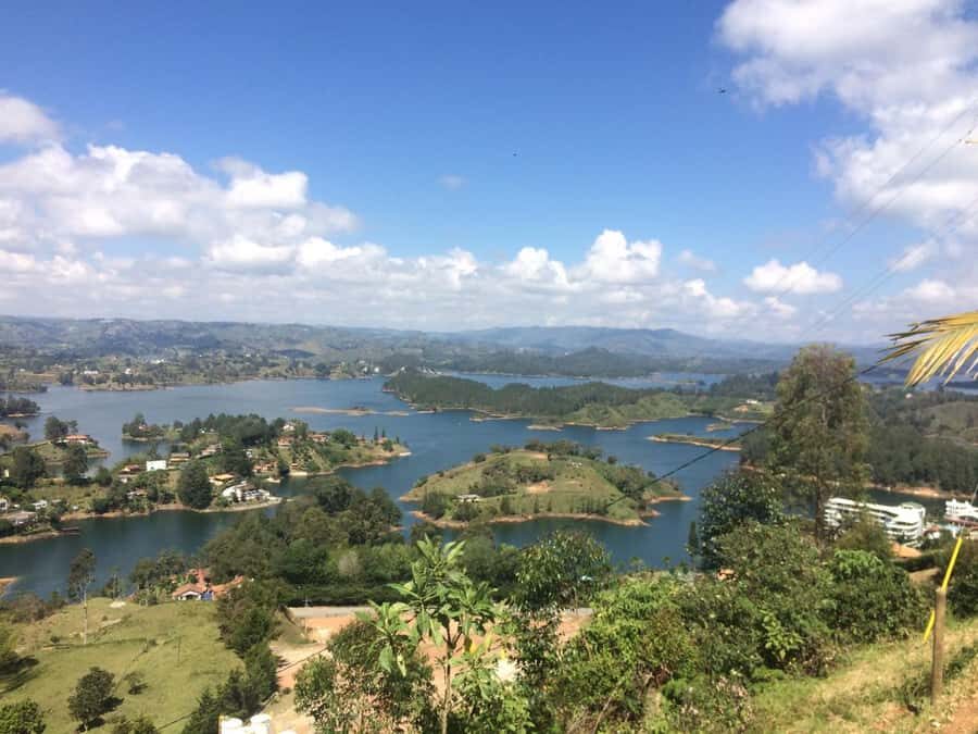 From Medellin: Private Guatape Car Tour with Coffee Tour - Guatapé on foot: color, squares, and story time