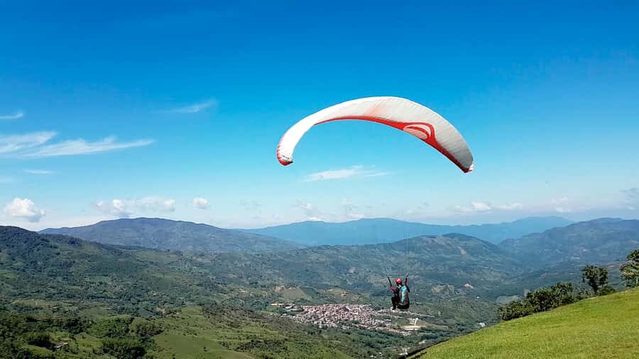 From Medellin: Private Paragliding Tour Over Waterfalls - A quick reality check: what to expect from the guide and vibe