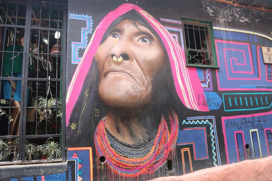 Graffiti Tour in La Candelaria Bogotá with Transportation - Café Herencia finish with Carlos Trilleras murals