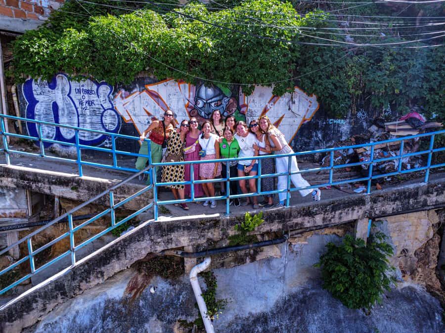 Medellín Comuna 13 local guides snacks and your own graffiti - Escalator project visit: the stop that makes the change visible