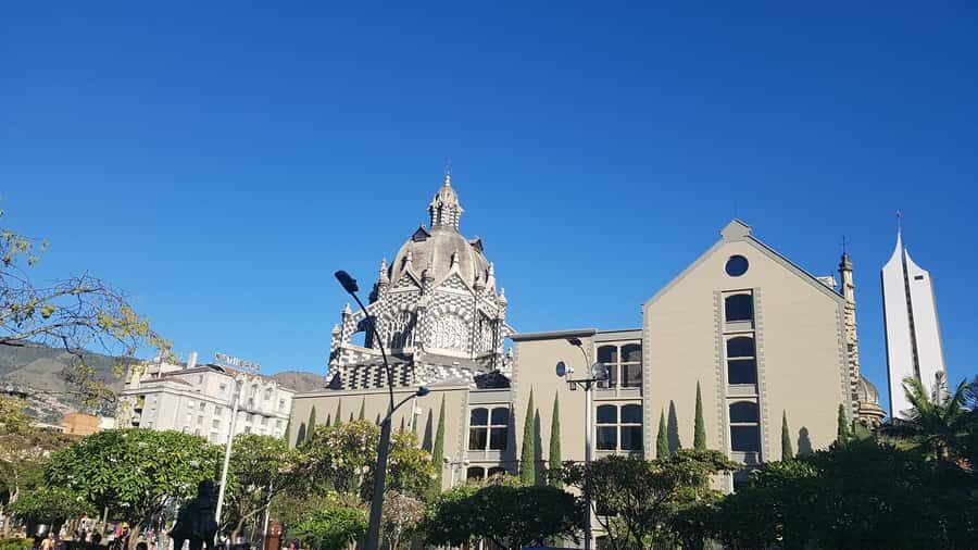 Medellín: Walking Tour with Cable Car and Botero Plaza - Santo Domingo Savio Library: Modern Architecture with Community Purpose