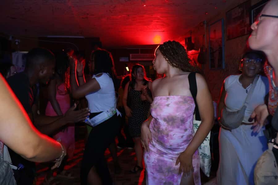 Nightlife: sunset boat party + tour of the old town - Meeting at Pegasos Pier: clock tower, second horse statue, and a logo shirt
