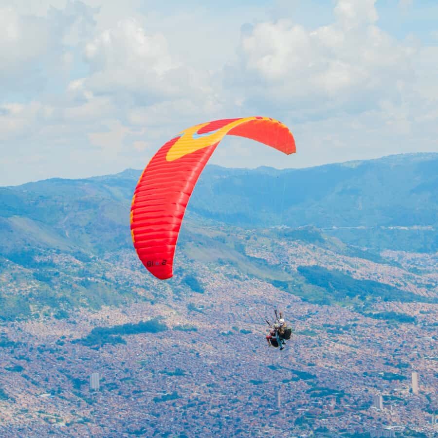 Paraglide over beautiful Medellin - Flying Over Medellín: What the 15–20 Minute Tandem Really Feels Like