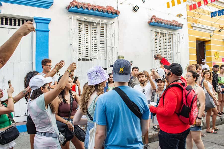 Shared Old Cartagena & Getsemani Tour with Wireless System - Plaza de la Aduana and Plaza de Los Coches: power, trade, and the old city machine
