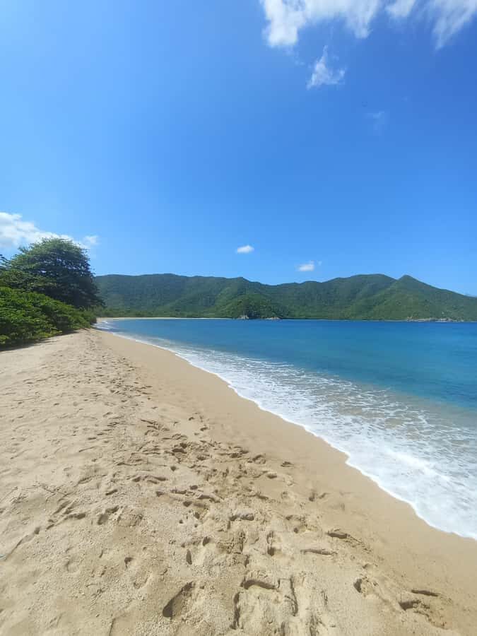SPEEDBOAT TOUR TO TAYRONA CRISTAL BEACH - Playa Cristal: snorkeling-friendly coral and long beach time
