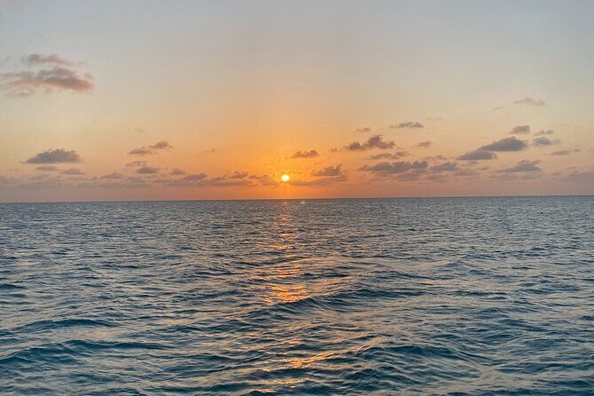 Sunset Tiki Bar Cruise in Caye Caulker, Belize - Boarding the Friki Tiki: what happens during the 1 hour 30 minutes